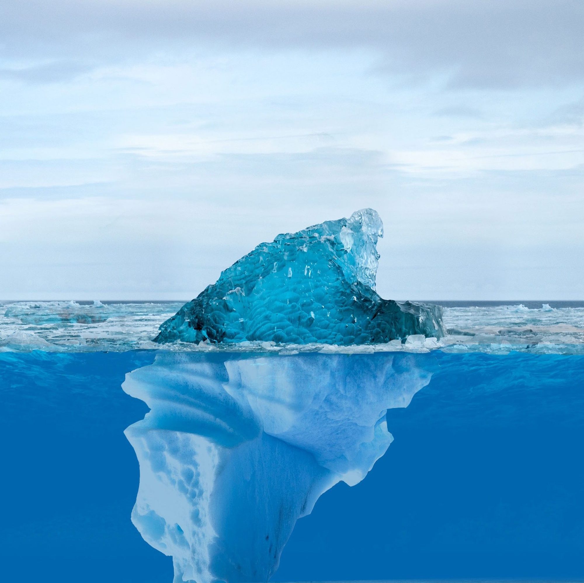 iceberg qui illustre la partie consciente et inconsciente de l'être humain pour comprendre le langage caché du corps dans une séance de kinésiologie